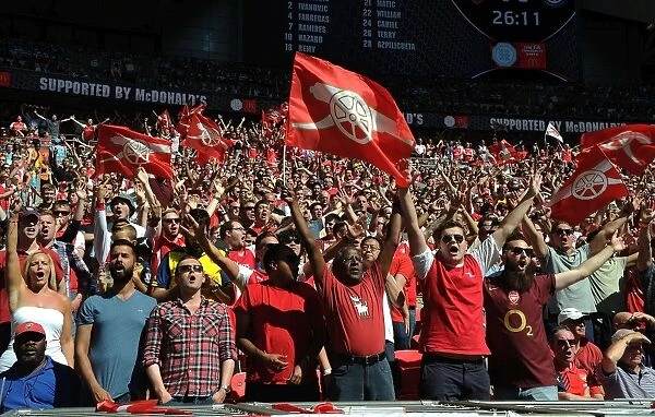 Arsenal Celebrate Community Shield Victory over Chelsea (2015-16): Arsenal Fans in High Spirits at Wembley Stadium