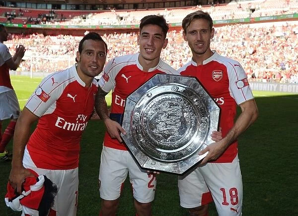 Arsenal Celebrate FA Community Shield Victory over Chelsea (2015): Santi Cazorla, Hector Bellerin, and Nacho Monreal Rejoice