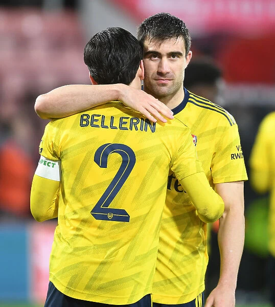 Arsenal Celebrate FA Cup Victory Over AFC Bournemouth: Hector Bellerin and Sokratis Embrace
