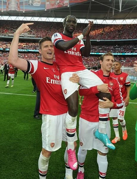 Arsenal Celebrate FA Cup Victory: Olivier Giroud, Bacary Sagna, and Nacho Monreal
