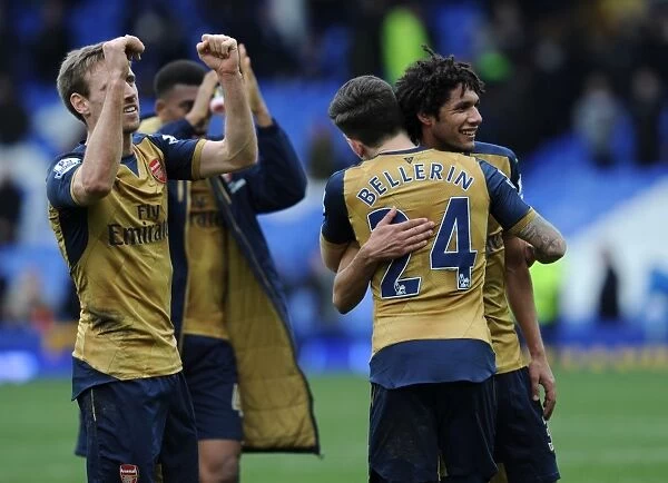 Arsenal Celebrate Hard-Fought Victory Over Everton in Premier League (2015-16)