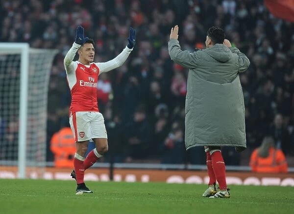 Arsenal Celebrate Victory: Alexis Sanchez and Mesut Ozil