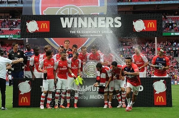 Arsenal Celebrates FA Community Shield Win Against Manchester City (2014)