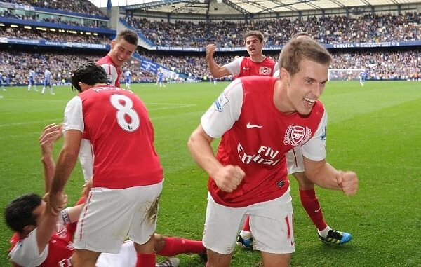 Arsenal Celebrates Victory Over Chelsea in the Premier League (2011-12)