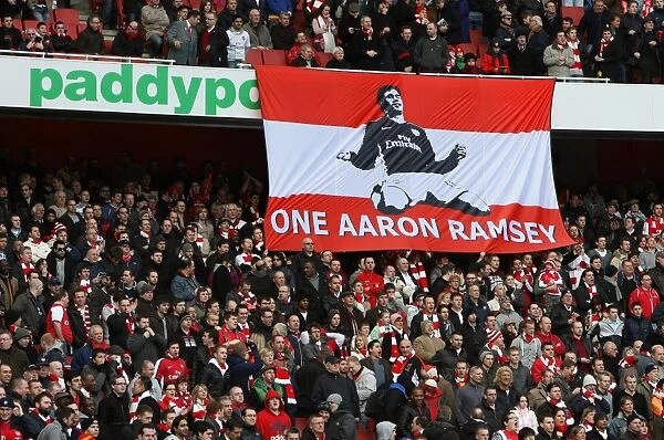 Arsenal Fans Rally Behind Injured Aaron Ramsey: Uniting in Support After His Broken Leg Against Burnley