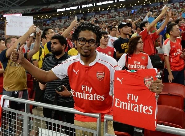 Arsenal Fan's Unwavering Passion: Arsenal v Singapore XI, Barclays Asia Trophy, Kallang, Singapore (July 15, 2015)
