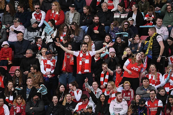 Arsenal FC: Passionate Fans in Action during Tottenham vs. Arsenal, FA Women's Super League, London 2023