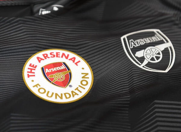 Arsenal Foundation: Uniting for Warm-Up at Arsenal vs. Huddersfield Match