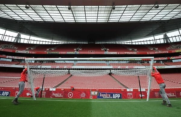 Arsenal Groundsman Prepares for Arsenal v Sunderland Match at Emirates Stadium