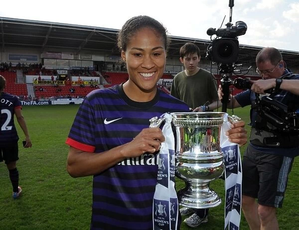 Arsenal Ladies Celebrate FA Women's Cup Victory: Rachel Yankey Lifts the Trophy