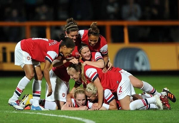 Arsenal Ladies FC Celebrate Victory: Kim Little and Teammates Rejoice After Winning The FA WSL Continental Cup Final vs. Birmingham City Ladies FC