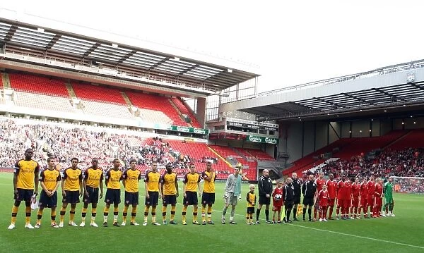 Arsenal and Liverpool line up before the match