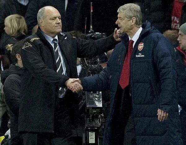 Arsenal manager Arsene Wenger and Fulham manager Martin Jol after the Barclays Premier League match between Arsenal and Fulham at Emirates Stadium on November 26, 2011 in London, England. Credit; Arsenal