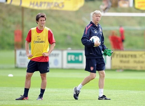 Arsenal manager Arsene Wenger with Tomas Rosicky. Arsenal Training Camp
