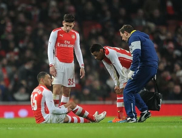 Arsenal: Oxlade-Chamberlain Seeks Medical Attention as Coquelin and Bellerin Look On During FA Cup Match vs Hull City