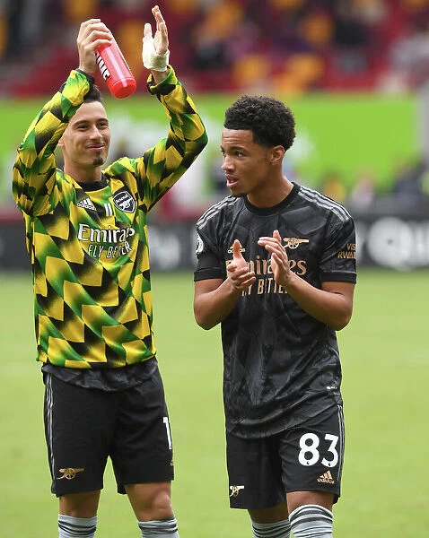 Arsenal Players Ethan Nwaneri and Gabriel Martinelli Celebrate with Fans after Brentford Victory, 2022-23 Premier League