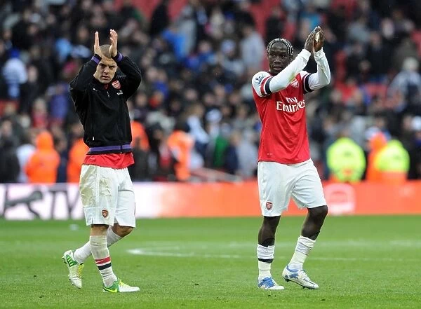 Arsenal Players Jack Wilshere and Bacary Sagna Celebrate with Fans after Victory over Queens Park Rangers