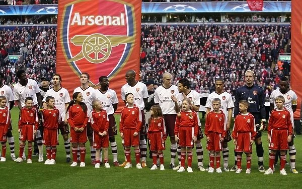 The Arsenal players line up before the match
