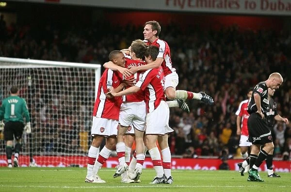Four Arsenal Stars and Bendtner: Celebrating a 6-0 Carling Cup Victory