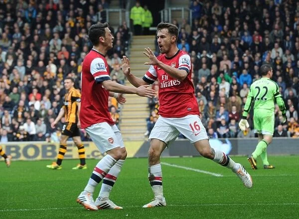 Arsenal Stars: Ramsey and Ozil Celebrate Goal in Hull City Victory, Premier League 2013-14