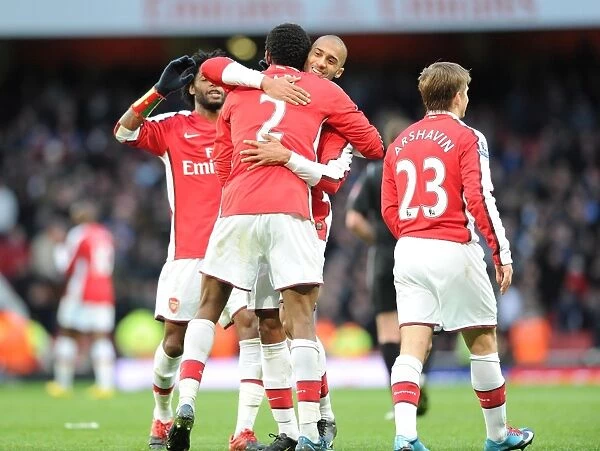 Arsenal Triumph: Diaby, Traore, Song, and Arshavin Celebrate 3-0 Over Aston Villa