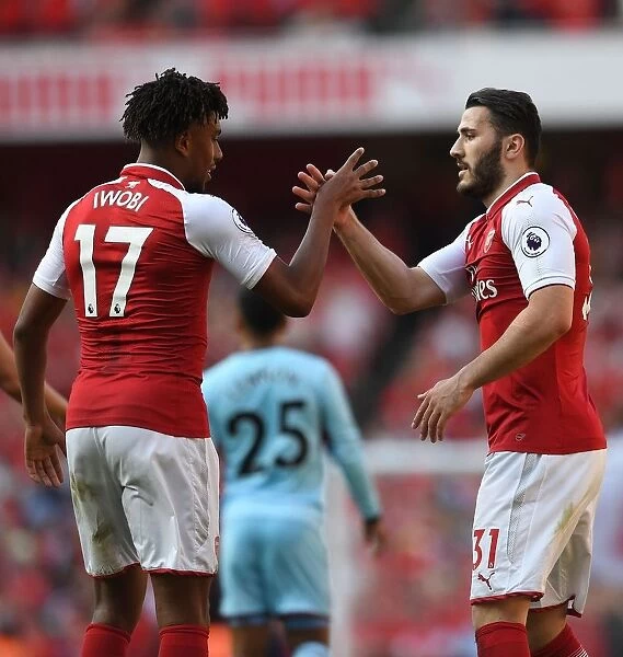 Arsenal Triumph: Sead Kolasinac and Alex Iwobi Celebrate Goals Against Burnley (2017-18)