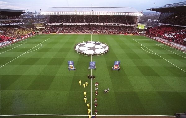 The Arsenal and Villarreal teams walk out before the match, the last floodlit match at Highbury