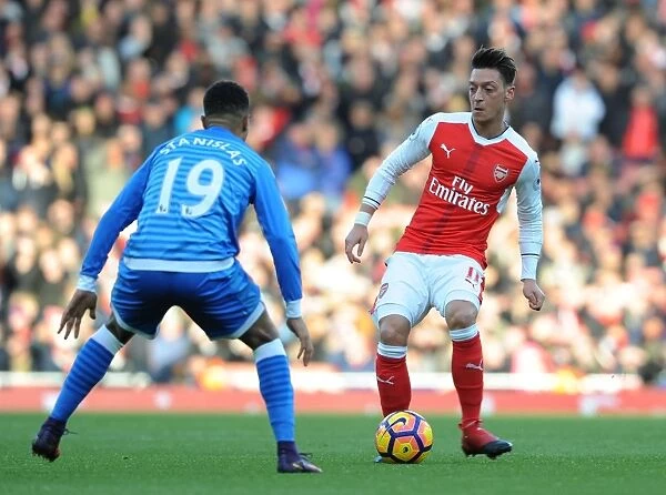 Arsenal vs. AFC Bournemouth: Mesut Ozil Clashes with Junior Stanislas in Premier League Showdown