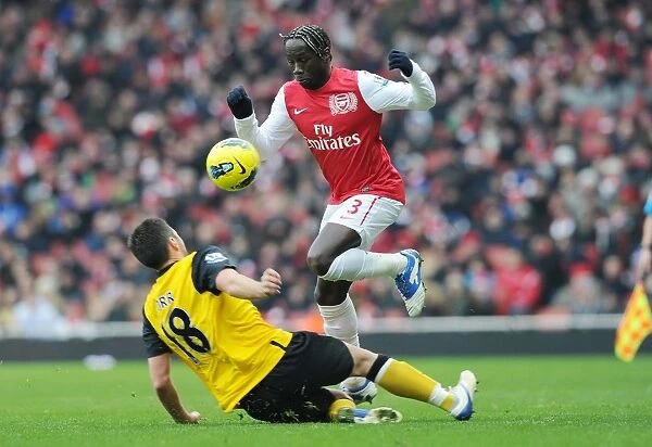 Arsenal vs. Blackburn Rovers: Sagna Soars Over Opponent in Premier League Clash (2011-12)