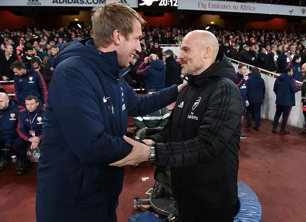 Arsenal vs Brighton: Pre-Match Greeting between Interim Coaches Mikel Arteta and Graham Potter (December 2019)