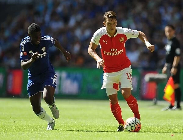 Arsenal vs. Chelsea Showdown: Ozil vs. Ramires - Community Shield Battle at Wembley Stadium