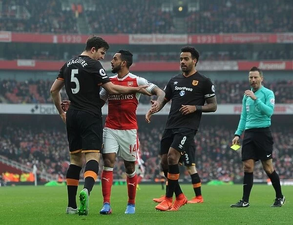 Arsenal vs Hull City: Theo Walcott Faces Off Against Maguire and Huddlestone