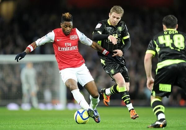 Arsenal vs Leeds United: FA Cup Clash - Alex Song Holds Off Adam Clayton