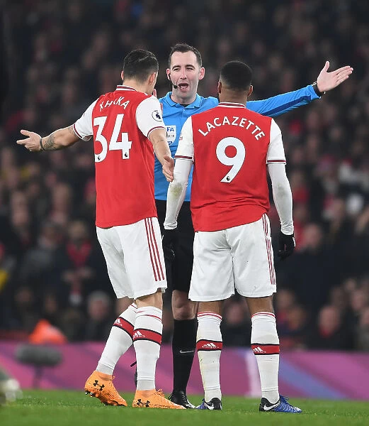 Arsenal vs Manchester United: Xhaka and Lacazette Protest Referee Decision during Intense Premier League Clash