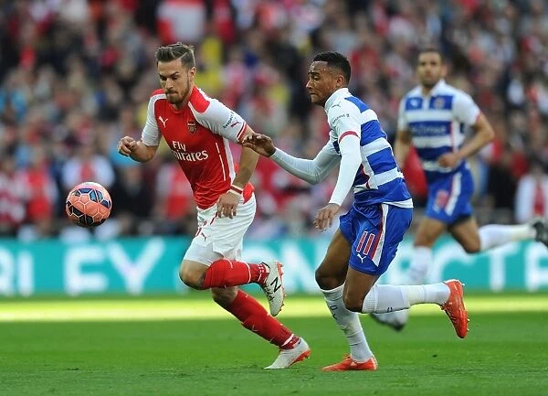 Arsenal vs. Reading FA Cup Semi-Final: Ramsey vs. Obita - A Battle at Wembley
