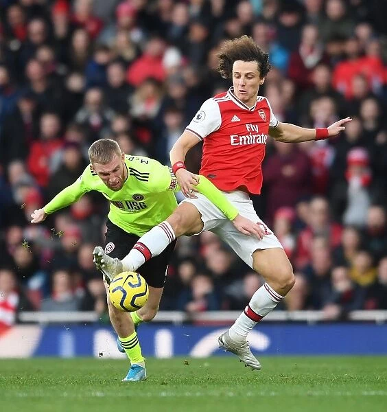 Arsenal vs Sheffield United: A Battle Between David Luiz and Oli McBurnie at the Emirates Stadium