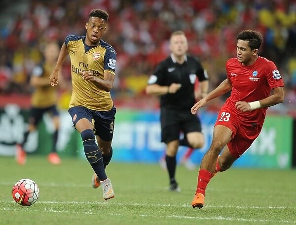 Arsenal vs Singapore XI: Barclays Asia Trophy Clash - Arsenal's Chris Willock Faces Off Against Zulfahim Arifin in Singapore (July 15, 2015)