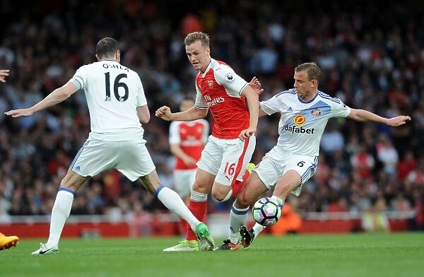 Arsenal vs Sunderland: Rob Holding Stands Firm Against John O'Shea and Lee Catermole