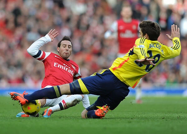Arsenal vs. Sunderland: Santi Cazorla Tackles Marcos Alonso in Intense Premier League Clash