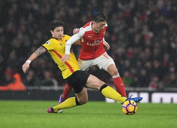 Arsenal vs. Watford: Mesut Ozil Faces Off Against Daryl Janmaat