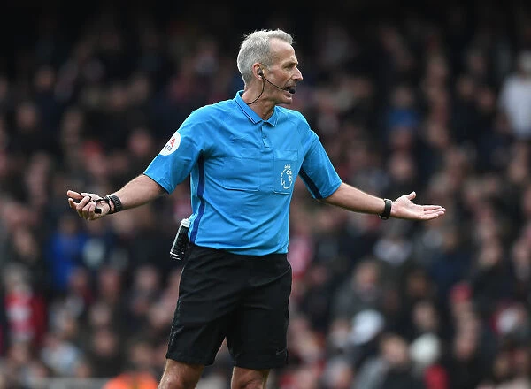 Arsenal vs. West Ham: Premier League Showdown - Referee Martin Atkinson Oversees the Action