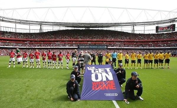 Arsenal and WBA teams line up before the match