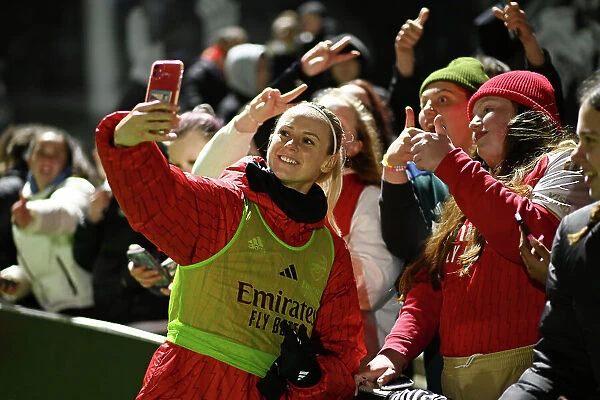 Arsenal Women Celebrate Conti Cup Victory: Amanda Ilestedt Amid Cheering Fans