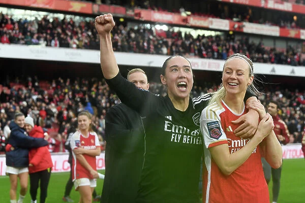 Arsenal Women Celebrate Super League Victory Over Chelsea (2023-24): Manuela Zinsberger and Amanda Ilestedt Rejoice in Emirates Stadium Triumph