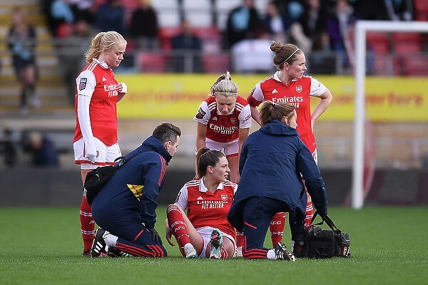 Arsenal Women Show Support: Kuhl, Williamson, and Little Console Injured Teammate Queiroz During Tottenham Clash