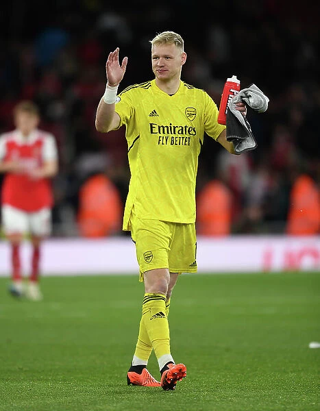 Arsenal's Aaron Ramsdale Celebrates Premier League Victory over Chelsea with Adoring Fans at Emirates Stadium (2022-23)