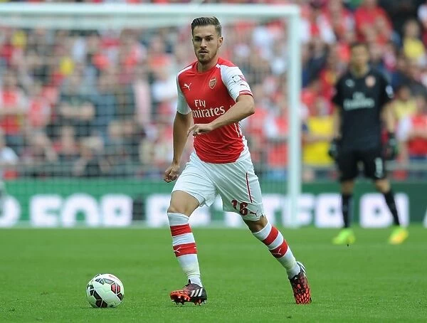 Arsenal's Aaron Ramsey in Action against Manchester City - FA Community Shield 2014 / 15