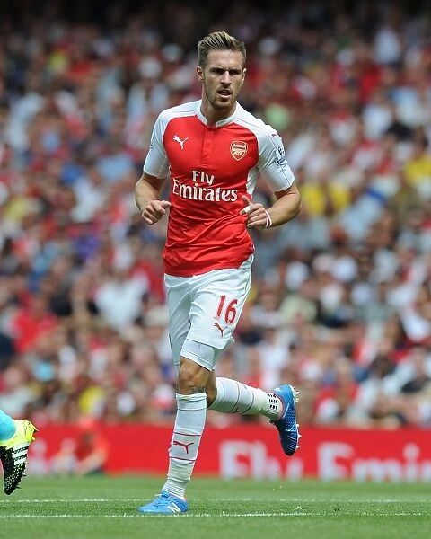 Arsenal's Aaron Ramsey Faces Off Against West Ham United in Intense 2015-16 Premier League Clash