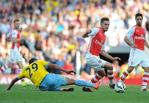 Arsenal's Aaron Ramsey Outmaneuvers Crystal Palace's Marouane Chamakh