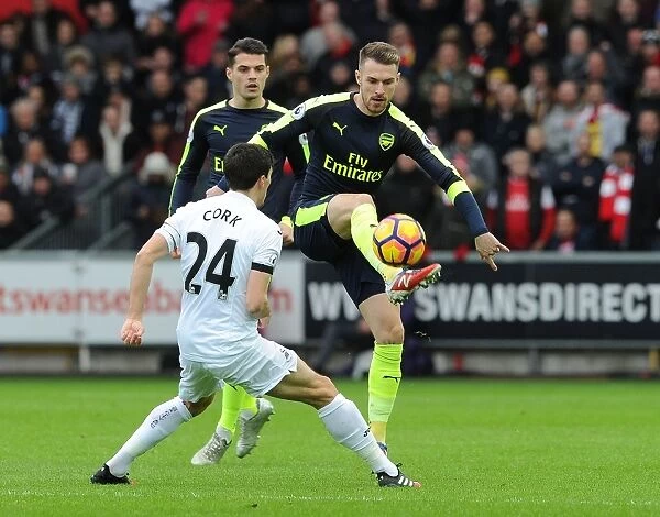 Arsenal's Aaron Ramsey Outsmarts Swansea's Jack Cork in Premier League Thriller